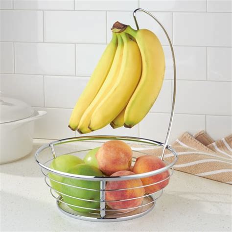 Fill the bowl with seasonal this countertop organizer keeps bananas hanging in the air, preventing premature aging and bruising. Fruit Bowl & Banana Hanger | STORE