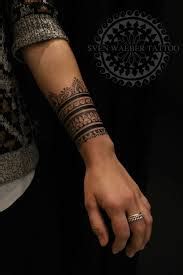 Example of three boards tattoo asian cuff in black and white. What Does Cuff Tattoo Mean? | Represent Symbolism