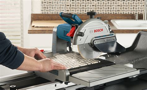 Using a wet saw to cut tiles. How to Cut Tiles - The Home Depot