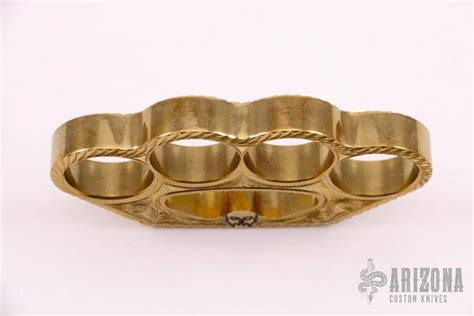 Want to feel a little more secure walking to your car at night? Engraved Brass Knuckles | Arizona Custom Knives