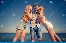 boy girls two kissing fun stock having outdoor friends women man group depositphotos