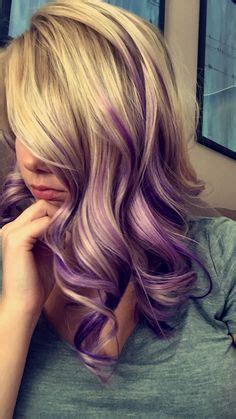 Dark shades make for extra striking styles on the singer's pale complexion, and this dark purple look is close enough to black to function as a neutral hair color. Purple and blonde hair (With images) | Hair color purple