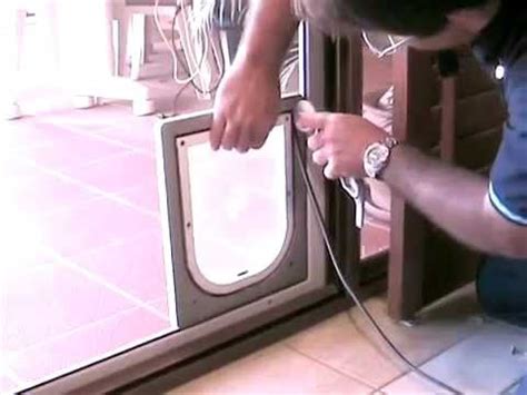 Open the door and measure 2 up from the. Easy Pet Door Installation - YouTube