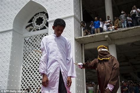 • the malaysian civil judicial system is based on common law. Indonesian women wait to be whipped in front of a baying ...