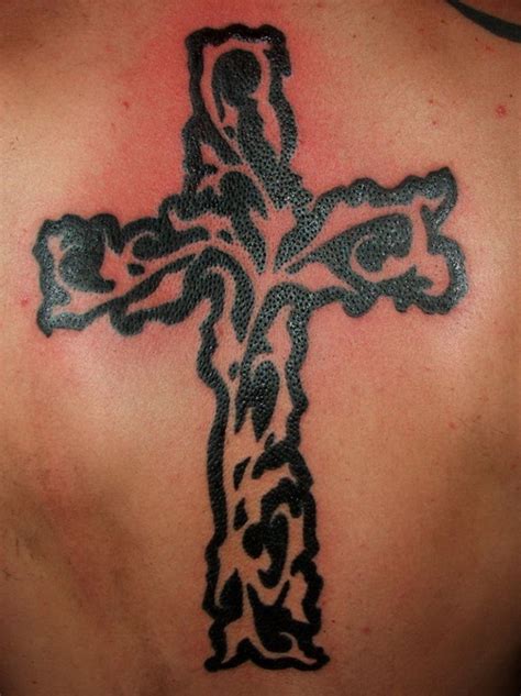 Tribal cross tattoos, in particular, are the best choice for someone who is looking to display courage, strength, and dedication from their marks. Tribal Cross Tattoos For Men - Inofashionstyle.com