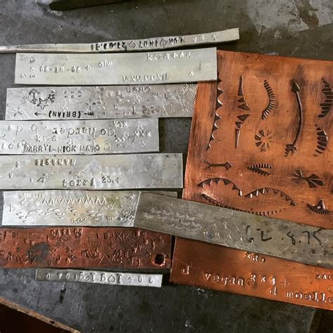 Metal stamping processes use dies and punches to cut the metal into the required shape. On occasion I will stamp an inscription on scrap metal to make sure it looks good or fits in the ...