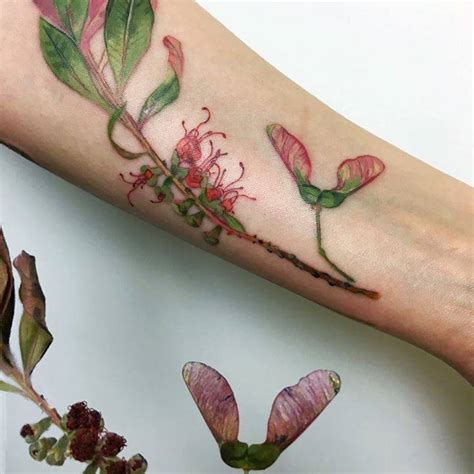 Maybe you would like to learn more about one of these? Live leaf tattoo with bottlebrush, bouteloua and maple.