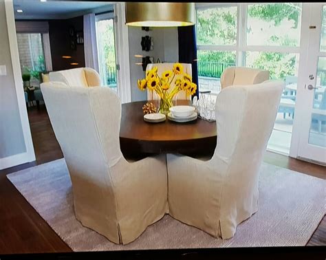 Leather, econubuck and faux leather with soft filling matched with a wooden structure. Winged Back Dining Chairs Round Dining Table. 5 Seat ...