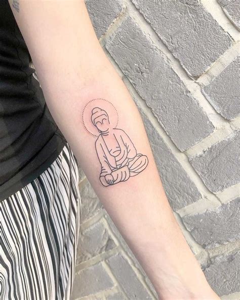 Many tibetan tattoos feature the symbol of the lotus flower and tibetan writing of various sayings or mantra. Minimalist Buddha tattoo by Loz Thomas inked on the left ...
