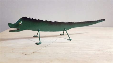 Akron_ice_house_sawblade_sculpture.png ‎(333 × 527 pixels, file size: Gator Made From Saw Blade | Scrap metal art, Metal ...