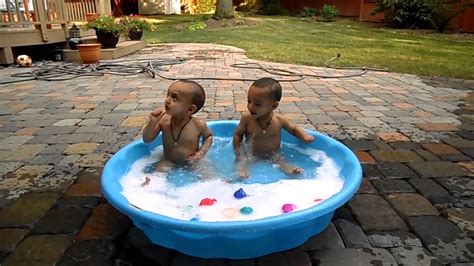 Included with the baby bathtub are a squeeze bottle so that you can spray your baby with water for some bath time fun, and a whale scoop for rinsing. Luv & Kush 9 1/2 months old, bathing outside - YouTube