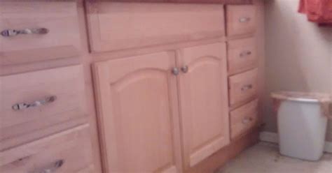 Wearing rubber gloves, simply rub the deglosser onto the wood with a clean lint free rag. Can you re-paint/stain prefinished cabinets without ...