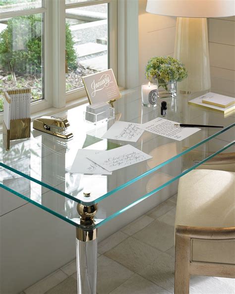 The most common finish is dark walnut finish as it offers an elegant look. Caracole Abby Glass Writing Desk #officedesign | Glass ...