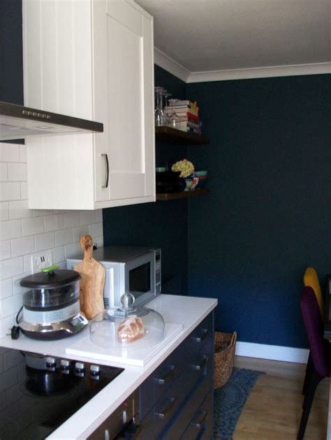 Dark gray thunderclouds with heavy rain and lightning; kitchen makeover results : blue Dark grey units&walls ...