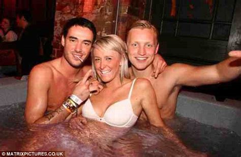 Check out this hot brunette stripping out of her black stockings. Jack Tweed gets to grips with Jacuzzi full of girls ...