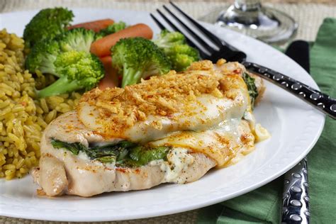 Our fabulous stuffed chicken recipe is perfect for entertaining. Cheesy Stuffed Herb Chicken | MrFood.com