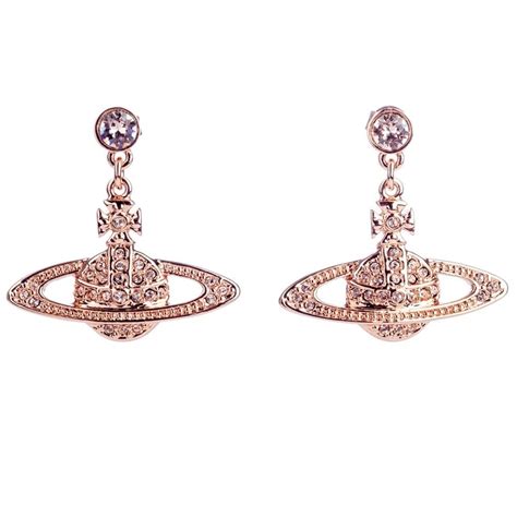 Classic vivienne westwood sterling silver heart & orb drop earrings with a pieced back. VIVIENNE WESTWOOD Rose Gold Toned and Crystal Mini Bas ...