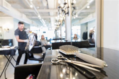 I sent her a picture and she did exactly that! Close Up Of Scissors And Hair Brush In Hair Salon Stock ...