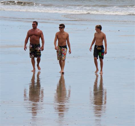 Natural black amateur having fun !! Tamarindo, Costa Rica Daily Photo: 3 guys on the beach