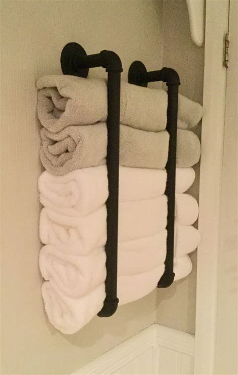 In addition to the bathroom, i also use them in my pantry, kitchen, cabinets and in my kiddos' rooms. Fun modern industrial towel storage idea with steampipe ...