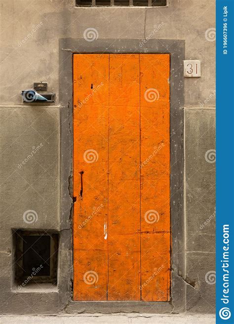 Maybe you would like to learn more about one of these? Wooden Front Door And House Number 31 On Old Wall. Orange ...