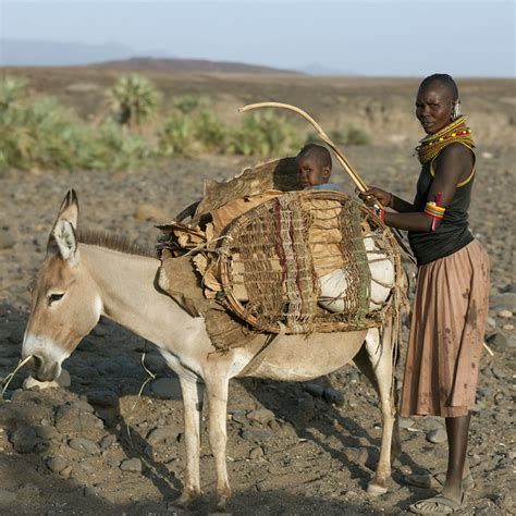 Free shipping on orders over $75. Turkana mother and baby with a donkey - Kenya | The ...