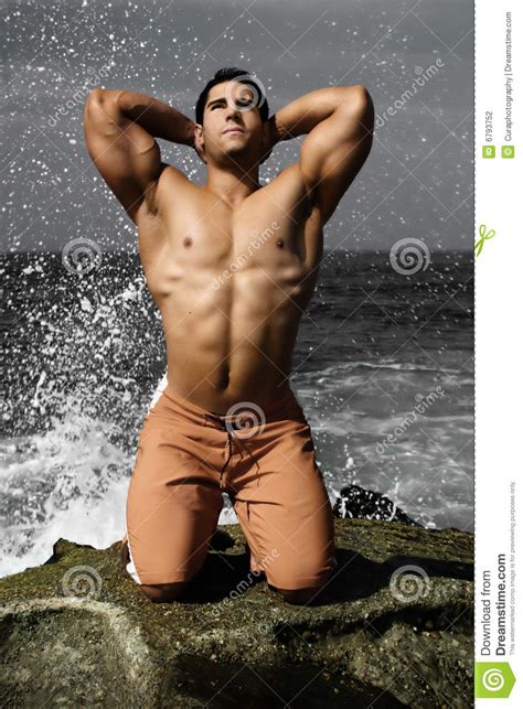 Sunset beach, in south myrtle beach, has the largest group of new neighborhoods. Body Builder on Beach stock photo. Image of pose, male ...