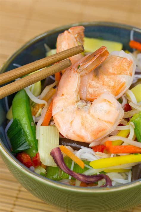 I whipped up some easy stir fried chinese noodles with shrimp the other night… and i threw every vegetable in there that i could think of… every week on the first day off from work, i clean out my refrigerator's produce cabinets as i rotate out any meals that need to visit the trash can. Chinese Food - Shrimp And Rice Noodle Stock Photo - Image of cuisine, fresh: 39406422