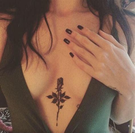 Tiny heart tattoo on the sternum. Rose Tattoo In Between Breast - Best Tattoo Ideas