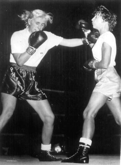 Match the phrasal verbs to their definitions and then use them in their correct form to complete the sentences. Women's Boxing - Barbara Buttrick