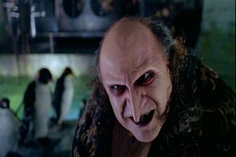 The penguin is attacked by some bats and falls through a glass window of his lair into some water. Batman Returns Penguin (Danny DeVito) Prosthetics Screen ...