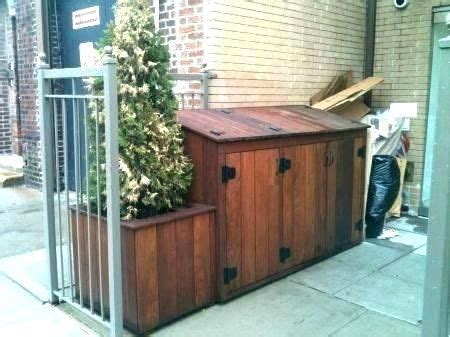 If you have larger trash bins and don't want to go with the wood option, then you could always turn to screens. trellis garbage can enclosure - Google Search | Garbage ...