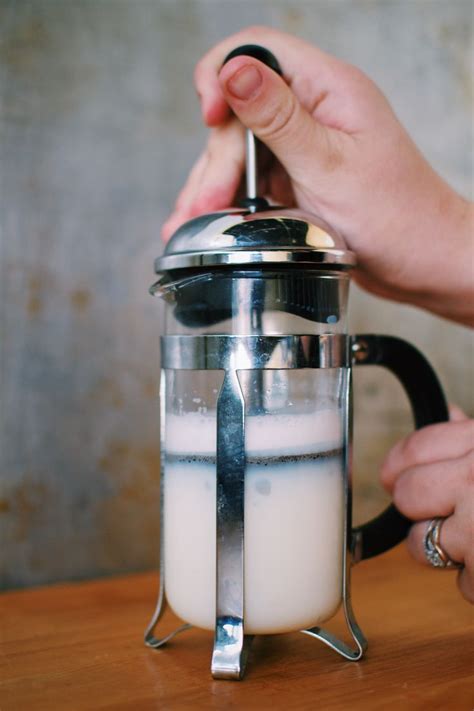 If you need to refresh your memory, here's the famous tiktok video make dalgona under a ray of sunshine with plants and string light around? How to make cold milk froth easy at home! | Milk foam ...