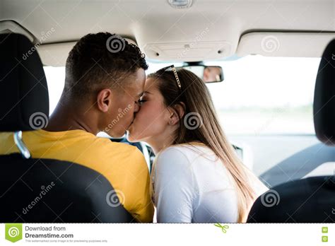 Think of it this way, you may be a good driver. Couple kissing in car stock image. Image of head, happy ...