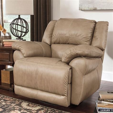 With a variety of color and material options, this walnew swivel recliner will be the perfect resting chair as you want. Lenoris Caramel Swivel Rocker Recliner by Signature Design ...