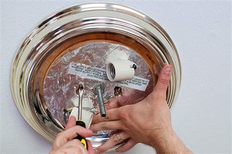 When replacing a light fixture, it's important to turn off the power before doing anything. How To Remove a Light Fixture | Light fixtures, Diy light ...