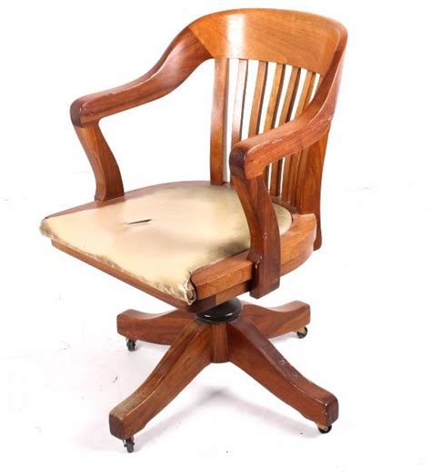 36 to 39 read more Mission Style Oak and Leather Rolling Desk Chair