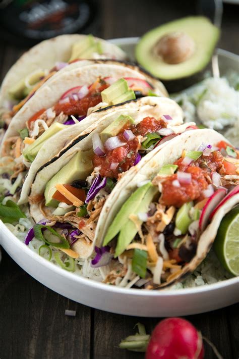 Mexican shredded chicken combine the salsa and taco seasonings; Instant Pot Shredded Salsa Chicken Tacos with Cilantro ...