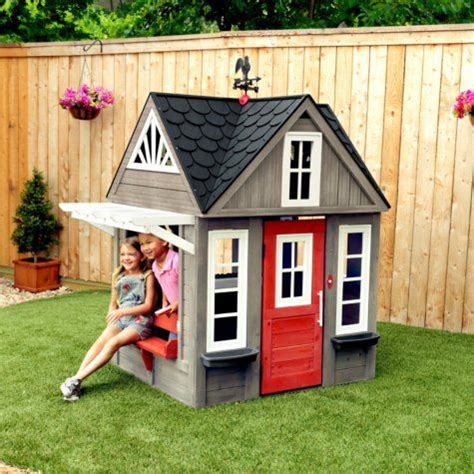 The kidkraft modern outdoor playhouse is packed with imaginative features, allowing kids to explore a whole new world without leaving the backyard. KidKraft Stonewood Outdoor Playhouse | Playhouse outdoor ...