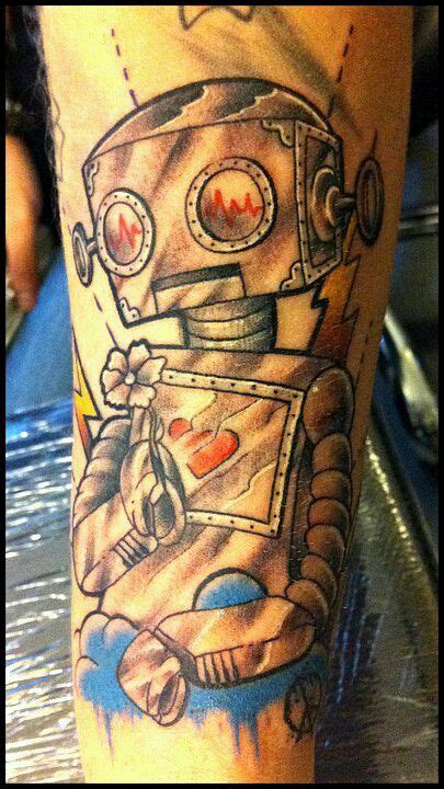 Last but not least, rihanna is looked to for tattoo inspiration. Adorable colorful robot tattoo. | Robot tattoo, Cartoon tattoos, Pattern tattoo