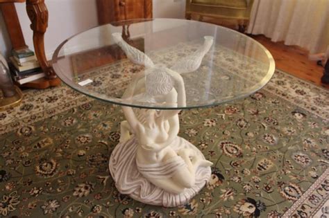 Check out our glass coffee table selection for the very best in unique or custom, handmade pieces from our coffee & end tables shops. Beautiful Angel Lovers Glass Top Coffee Table H55cm X D80cm