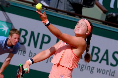 Jelena ostapenko holds the french open trophy aloft. Jelena Ostapenko - French Open Tennis Tournament 2018 in ...