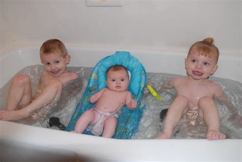 After your infant's umbilical cord falls off, you can bathe them in a baby bathtub. The Ericson Family: Rub-A-Dub Dub...3 Babes in a Tub