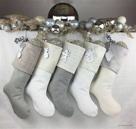 Buy top selling products like cozy cable knit personalized christmas stocking in teal and gingerbread characters personalized christmas stocking in personalized christmas stockings. Elegant and Modern White and Silver Christmas Stockings ...