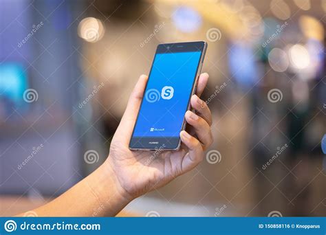Skype for android is an application that provides video chat and voice call services. CHIANG MAI, THAILAND - Oct. 28,2018: Man Holding HUAWEI ...