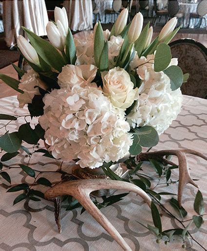 Hours may change under current circumstances Elegant Ivory Centerpiece in Lafayette, LA - FLOWERS ETC