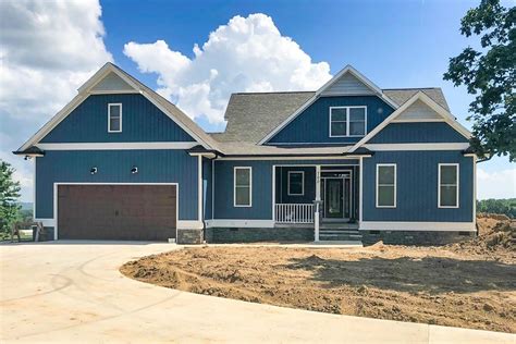 The garage is easy to access and connects to the main house which is set back into the site and. Plan 86312HH: 4-Bed Country Craftsman House Plan with Rear ...