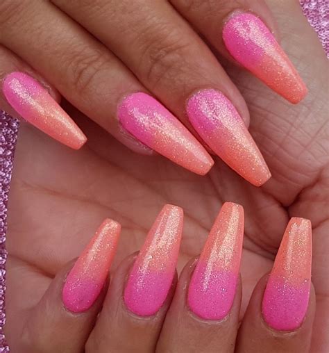 She chose a graphic design using. Pink and coral ombre with glitter on acrylic sculpted ...