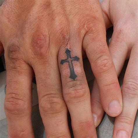 To cross one's fingers is an action commonly performed to wish for luck, to implore god for protection or to ward off evils and illnesses, among other things. Pin on Best Tattoos For Men