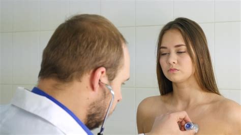 The examination is held across russia and in other states. Male Doctor Examine Patient by MBKN | VideoHive